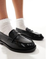 flat loafers in black